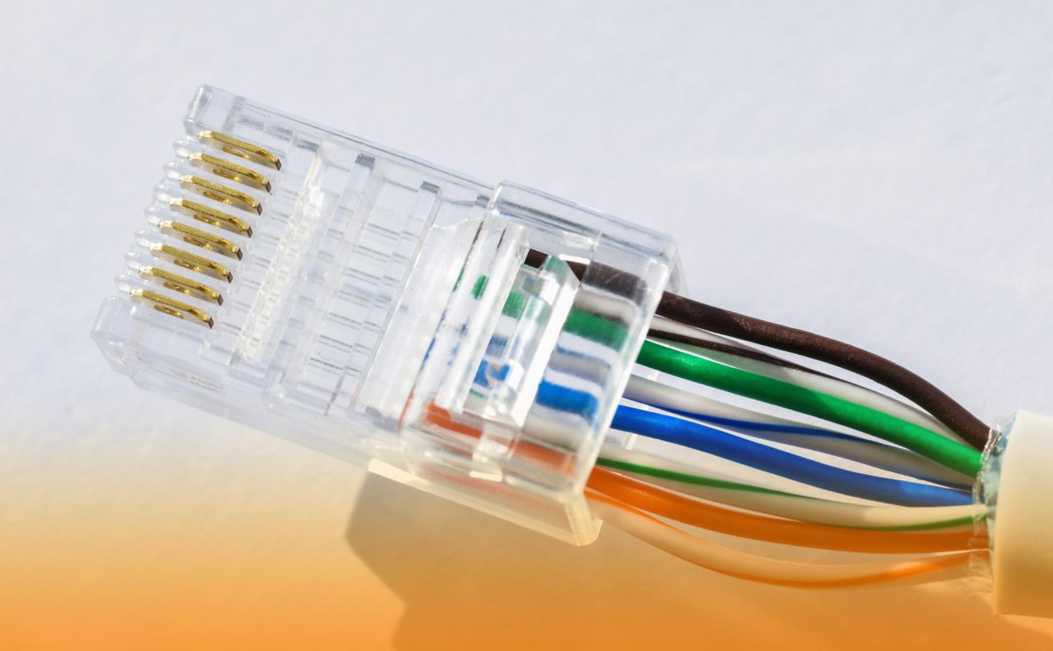 Ethernet-wires-being-inserted-into-an-RJ45-connector-1200x800.jpg